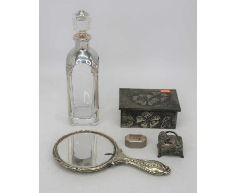 A silver plate mounted glass decanter; together with a dressing table mirror; napkin ring; and two dressing table boxes 