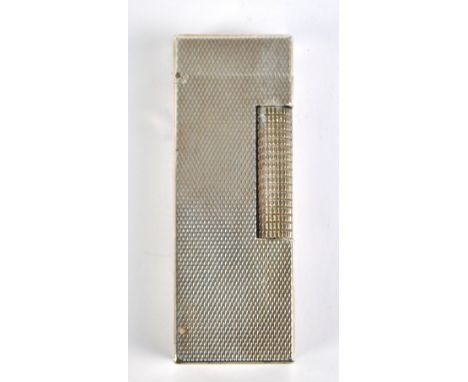 A Dunhill US RE 24163 patented rectangular cigarette lighter with engine turned decoration, length 6.5cm.