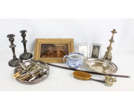 A small group of collectors' items including crystoleum, a pair of candlesticks, a single brass candlestick, a small quantity