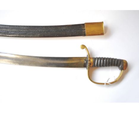 A 19th century police constable's hanger with shagreen grip, brass knuckle guard and curved blade inscribed Staffordshire Con