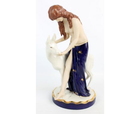 ROYAL DUX; a figure group of a semi-naked maiden and doe, with pink triangle to base and numbered 2963, height 37cm. CONDITIO