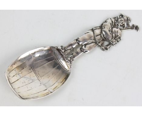 BERTHOLD MULLER; a Victorian hallmarked German pseudo Hanau silver spoon with stem modelled as man playing bagpipes and with 