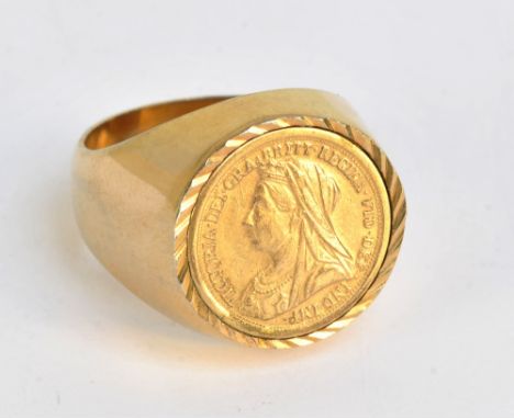 A yellow metal ring set with Victorian gold coin, ring size W, approx 24g.