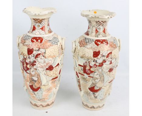 A pair of large Japanese Satsuma vases of baluster forms with flared rims, painted in enamel with figural scenes and with app