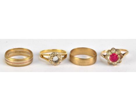 An 18ct yellow gold dress ring (lacking central stone) approx 3.3g and three 9ct yellow gold rings, approx 8.9g (4).