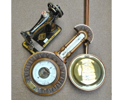 A Singer sewing machine, a carved mahogany and stained beech barometer and a brass warming pan (3).