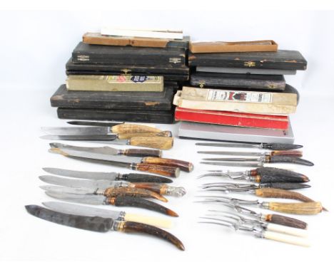 A large quantity of carving sets and antler handled carving tools, many sets incomplete.