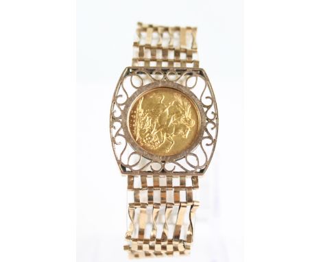 A George V full sovereign, 1911, in 9ct gold gate link bracelet mount with heart shaped padlock clasp, combined approx 26g.
