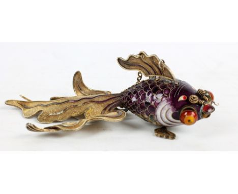 A mid-20th century Chinese silver gilt and enamel decorated articulated model of koi fish with suspension chain, length 17.5c