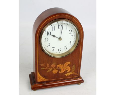 An Edwardian mahogany and floral inlaid domed mantel clock, the circular dial set with Arabic numerals, height 20cm.