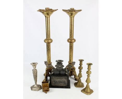 A large pair of brass knopped candlesticks with foliate rims, the triangular bases with crosses to each side, height of each 