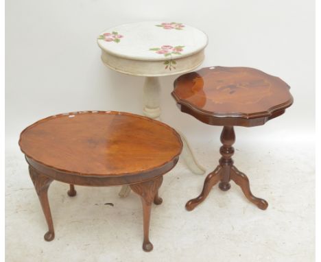 A reproduction mahogany and floral inlaid shaped circular table on baluster and ring turned column with tripod base, diameter