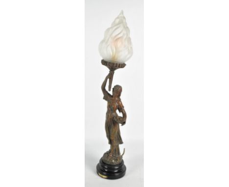 A spelter table lamp in the form of a girl holding a torch aloft, signed 'Ruffoni' to base with plaque inscribed 'automne', h