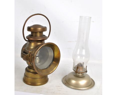 A Lucas 'King of the Road' brass carriage lamp, height 26cm, and paraffin lamp (2).