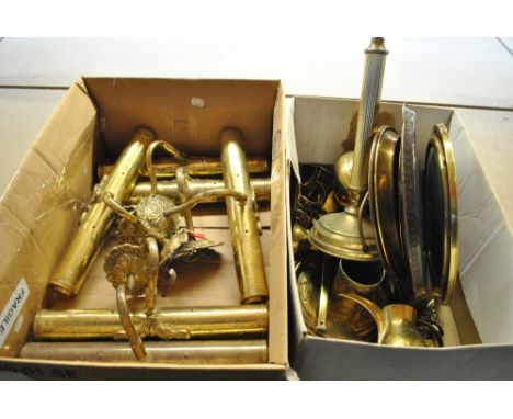 A quantity of brassware to include a group of light fittings, a porthole style mirror, dishes, table lamp stamp, vase etc.