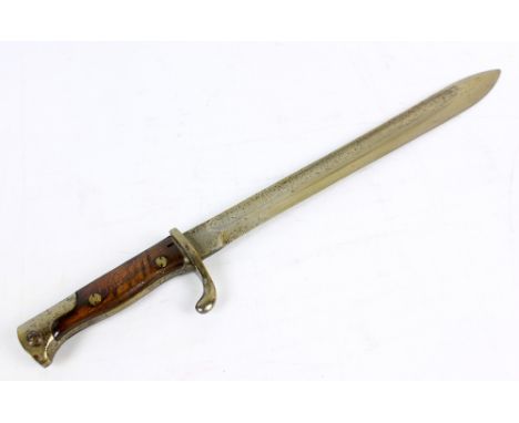 A late 19th/early 20th century German bayonet, the blade stamped for Weyersburg Kirschbaum & Co Solingen and with wooden grip