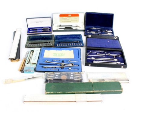 A collection of drawing instruments to include two Everlast 'Black Magic' pens and Uno pen stencil outfit and AW Faber slide 