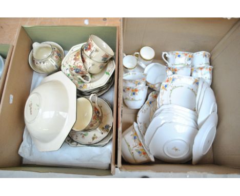 A Royal Doulton 'Q' pattern part dinner service comprising cups, saucers, milk jug, side plates, salad plates, serving bowl, 