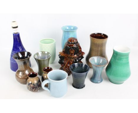 A collection of Royal Lancastrian ceramics to include a dark blue ribbed tapering vase, height 11cm, a pair of agate effect v