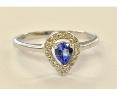 A 9ct white gold diamond and tanzanite ring, size N, approx 1.7g.