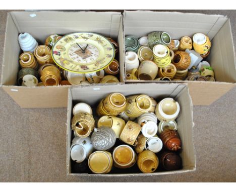 A very large quantity of mainly ceramic honey pots including examples by Haxby, Price Brothers, Brixton Pottery, ICTC, Border