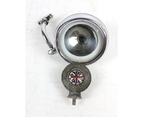 An RAC mascot inscribed 'Royal Automobile Club Associate' with central enamel union flag (AF), diameter 18cm and an Eversure 