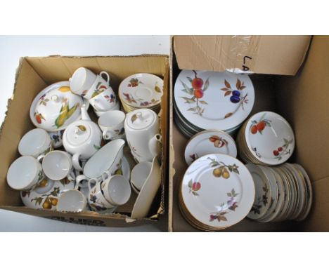 A Royal Worcester 'Evesham' and 'Evesham Vale' pattern decorated dinner and teaware including dinner plates, a circular turee