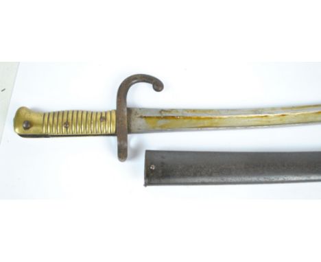 A 19th century French Chassepot-type bayonet, the blade back engraved 'Culle Janvier 1872', stamps to base of blade and cross