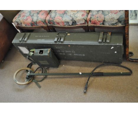 A cased military issue metal detector and a mine sweep with detector unit (2).