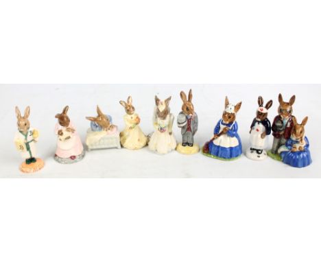 Nine Royal Doulton Bunnykins figures; DB167 'Mother and Baby', DB158 'New Baby', DB101 'Bride' (second quality), DB102 'Groom