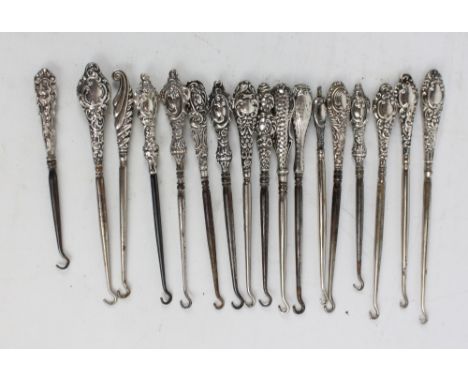 A collection of medium sized hallmarked silver sheath handled buttonhooks including examples by J & R Griffin, Chester 1913, 