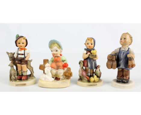 Three Goebel figures to include 'Feeding Time' and a further similar example (4).