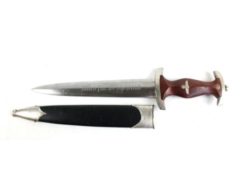 A WWII period German SA dagger with wooden handle set with emblem, the Solingen Hammesfahr Cie. blade inscribed 'Alles für De