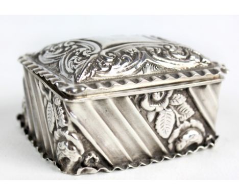 JOSEPH WHITTEN (probably); a Victorian hallmarked silver rectangular snuff box with embossed decoration and crimped edges to 