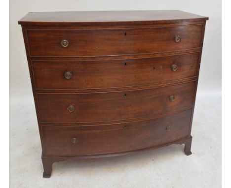A Regency mahogany bow fronted chest of four long drawers, the top with strung edges, raised on bracket feet, width 109cm.