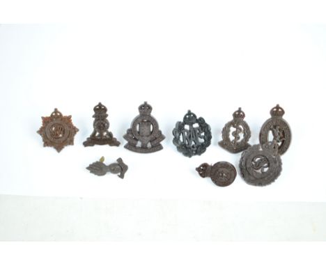 A group of 9 plastic economy cap and collar badges comprising RAF, Royal Engineers (x2), Royal Corps of Signals, Royal Army P