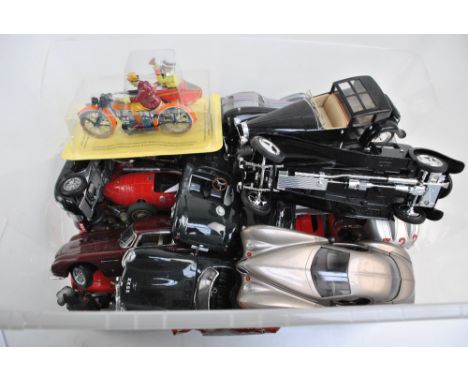 A large quantity of predominantly diecast vehicles including Burago and Solido many makes including Ferrari and Bugatti.