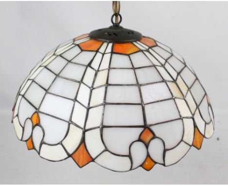 A modern Tiffany style circular ceiling lamp in white and orange, diameter 40cm.