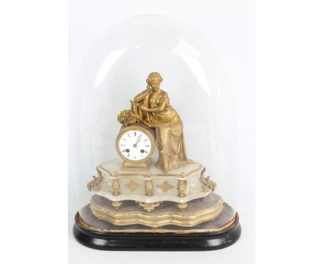 A late 19th century French gilt spelter and alabaster mantel clock with eight day Japy Frères movement, the white enamel dial