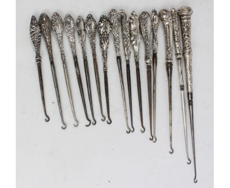A collection of hallmarked silver sheath handled buttonhooks including an imported example by J C Plimpton & Co, Chester 1903
