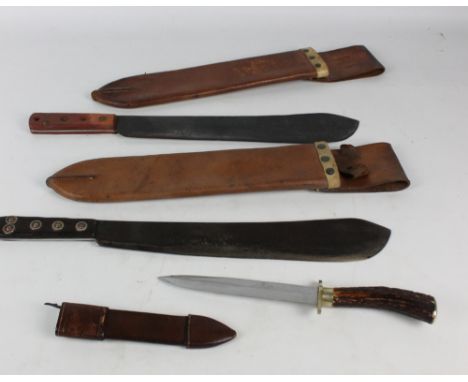 A WWI period machete stamped Samuel, Sheffield 1917 in leather scabbard, a similar example stamped 'Endure' Josh Beal & Sons,