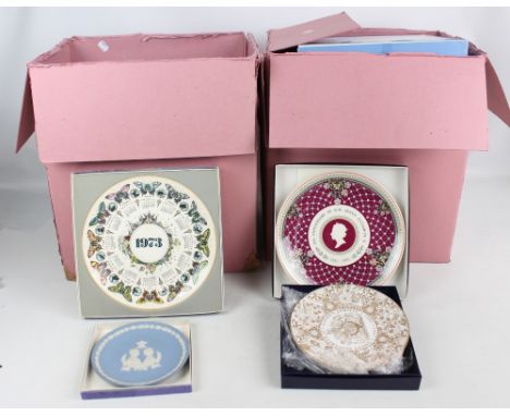A large collection of Wedgwood calendar plates from the 1970s, 80s and 90s, also a jasperware commemorative plate, a Royal Wo