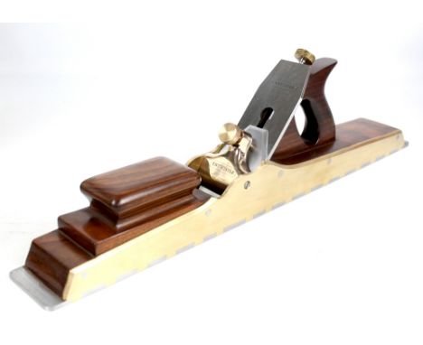 ENTWISTLE; a contemporary wooden brass mounted Norris type 22.5in plane dated 1992 with dove tailed base plate and screw adju