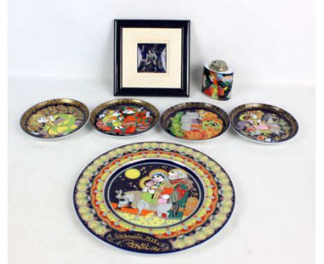ROSENTHAL; a set of four 'Aladdin and the Magic Lamp' pattern decorated circular plates, diameter 16cm, a 1917 Christmas plat