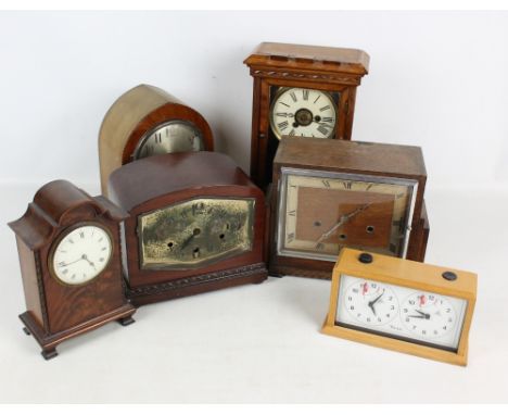 A group of various mantel clocks, an Edwardian lancet shaped example and a 1920s oak Art Deco example with rectangular chapte