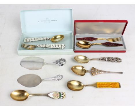 A MICHELSEN; a collection of Danish sterling silver and enamel calendar spoons and forks to include July 1959, the finial in 