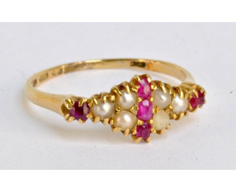 An 18ct yellow gold dress ring set with pearls and pink stones, ring size R, approx 2.7g.