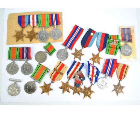 TWO WWII GROUPS AND SINGLES; a group of four and a group of two to include War and Defence Medals, 1939-1945 and France and G