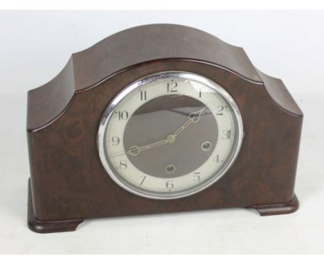 A Smith's bakelite cased mantel clock, the circular dial set with Arabic numerals, height 36cm.