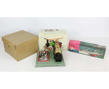 A boxed Mamod steam tractor, a Fleischmann engine and a boxed 'Frogflite' boat (3).